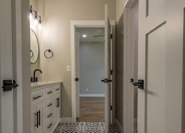 21650 Lake Rd, Glouster, OH 45732 - bathroom featuring vanity, baseboards, and tile patterned flooring