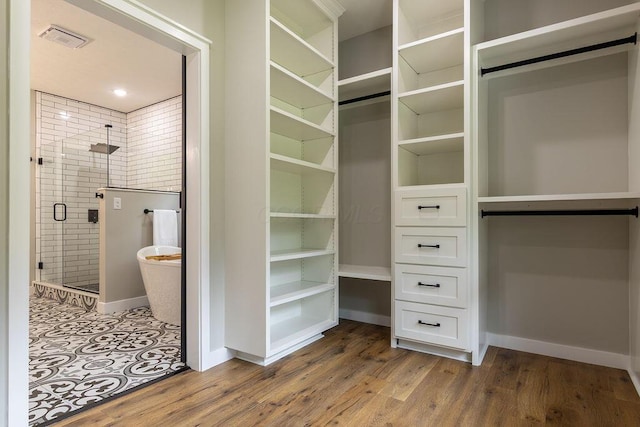 21650 Lake Rd, Glouster, OH 45732 - walk in closet featuring wood finished floors