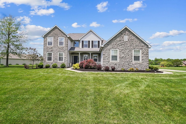 401 Warrenpoint Ln, Pataskala, OH 43062 - traditional home featuring stone siding and a front lawn