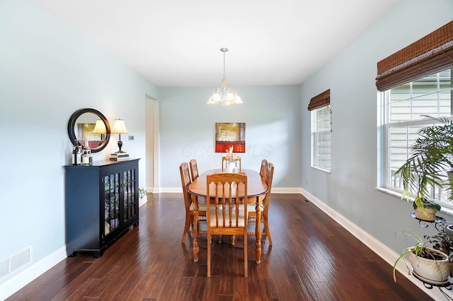 401 Warrenpoint Ln, Pataskala, OH 43062 - dining space with a chandelier, dark wood finished floors, and baseboards