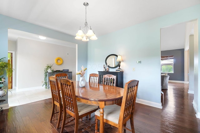 401 Warrenpoint Ln, Pataskala, OH 43062 - dining area with a chandelier, hardwood / wood-style floors, and baseboards