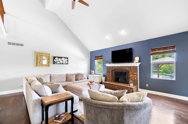 401 Warrenpoint Ln, Pataskala, OH 43062 - living room with ceiling fan, dark wood-style floors, baseboards, a brick fireplace, and high vaulted ceiling
