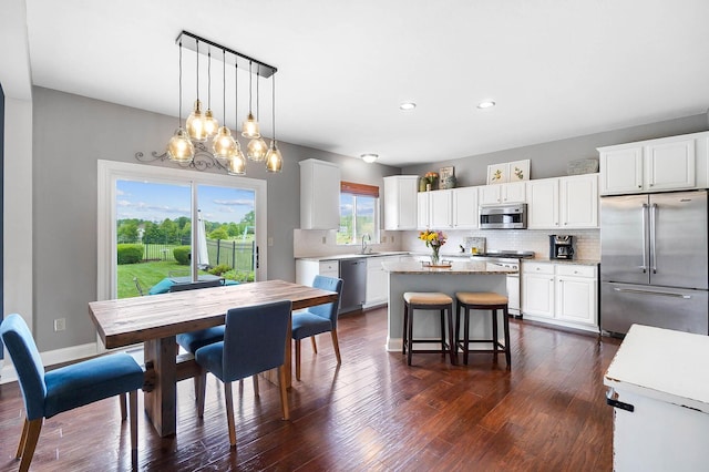 401 Warrenpoint Ln, Pataskala, OH 43062 - dining space with dark wood-style floors, recessed lighting, and a chandelier