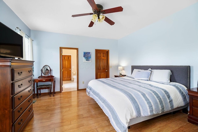401 Warrenpoint Ln, Pataskala, OH 43062 - bedroom featuring light wood-style flooring, ceiling fan, ensuite bath, and baseboards