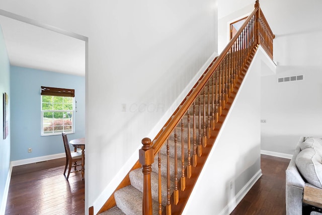 401 Warrenpoint Ln, Pataskala, OH 43062 - stairway featuring hardwood / wood-style flooring and baseboards
