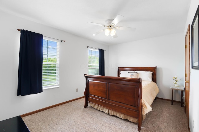 401 Warrenpoint Ln, Pataskala, OH 43062 - bedroom with baseboards, a ceiling fan, and carpet
