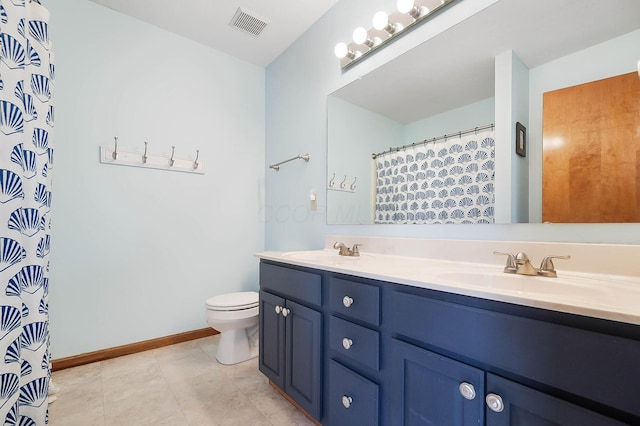 401 Warrenpoint Ln, Pataskala, OH 43062 - full bath with double vanity, toilet, baseboards, tile patterned flooring, and a shower with curtain