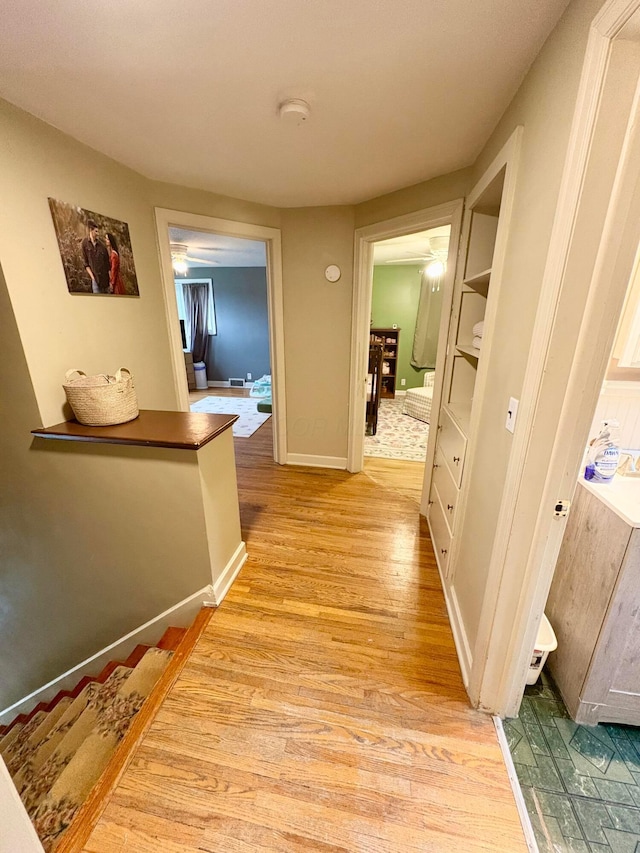 2010 S Main St, Findlay, OH 45840 - hallway featuring light wood-style flooring and baseboards