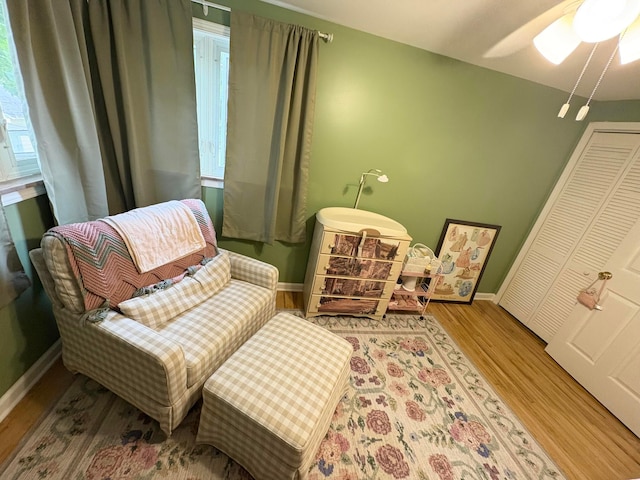 2010 S Main St, Findlay, OH 45840 - sitting room featuring wood finished floors, baseboards, and ceiling fan