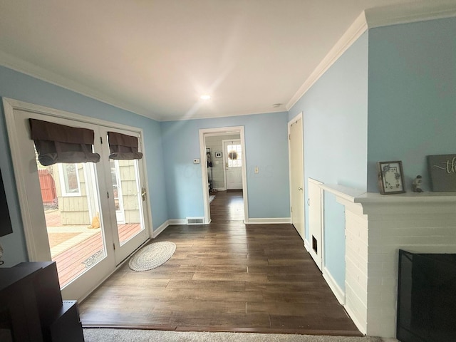 2010 S Main St, Findlay, OH 45840 - interior space with crown molding, wood finished floors, baseboards, and a fireplace
