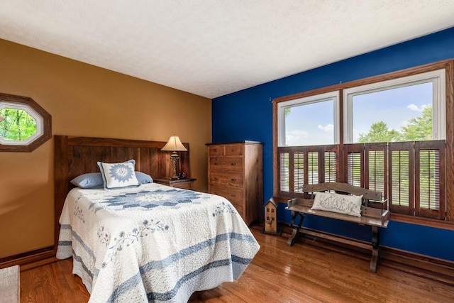 8263 Bennington Chapel Rd, Centerburg, OH 43011 - bedroom with wood finished floors and baseboards