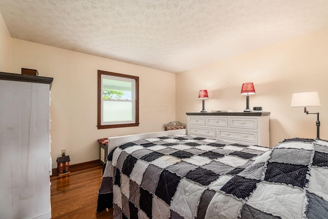 8263 Bennington Chapel Rd, Centerburg, OH 43011 - bedroom with wood finished floors, baseboards, and a textured ceiling