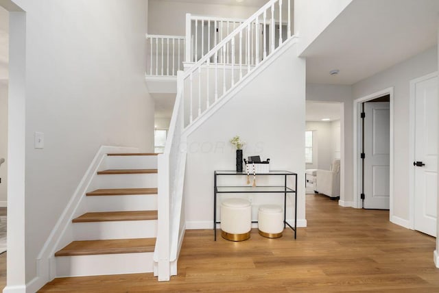 6377 Dietz Dr, Canal Winchester, OH 43110 - stairs featuring wood finished floors and baseboards