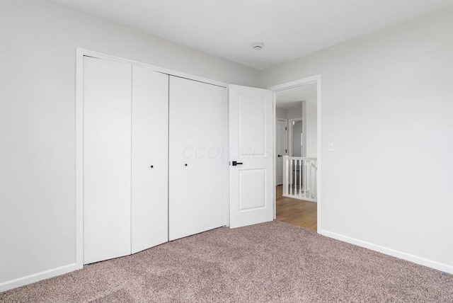 6377 Dietz Dr, Canal Winchester, OH 43110 - unfurnished bedroom featuring carpet floors, a closet, and baseboards