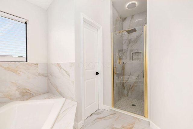 6377 Dietz Dr, Canal Winchester, OH 43110 - full bath with marble look tiles, a marble finish shower, and a garden tub