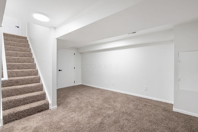 6377 Dietz Dr, Canal Winchester, OH 43110 - finished below grade area featuring carpet, stairway, and baseboards