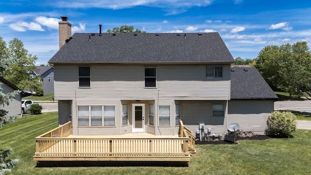 6377 Dietz Dr, Canal Winchester, OH 43110 - back of house with a yard, a chimney, a wooden deck, and roof with shingles