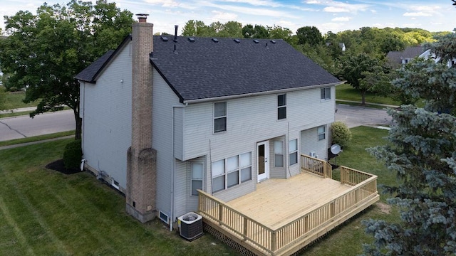 6377 Dietz Dr, Canal Winchester, OH 43110 - back of property with central AC, a chimney, a yard, a wooden deck, and roof with shingles