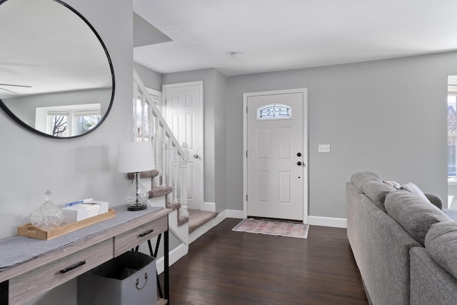 41 N Westmoor Ave, Columbus, OH 43204 - foyer with stairs, dark wood finished floors, plenty of natural light, and baseboards