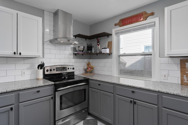 41 N Westmoor Ave, Columbus, OH 43204 - kitchen featuring stainless steel electric range oven, exhaust hood, gray cabinets, and decorative backsplash