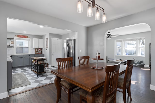41 N Westmoor Ave, Columbus, OH 43204 - dining area with plenty of natural light, arched walkways, wood finished floors, and baseboards