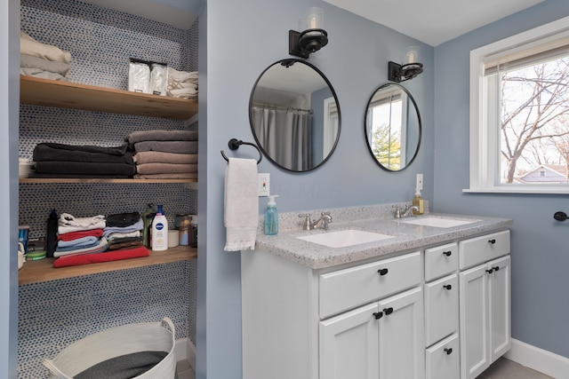 41 N Westmoor Ave, Columbus, OH 43204 - bathroom with double vanity and baseboards