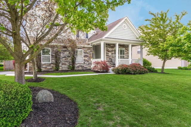 6458 Tallman Ct, Canal Winchester, OH 43110 - view of front of property with covered porch, stone siding, and a front yard