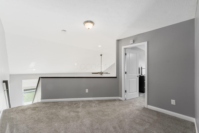 6458 Tallman Ct, Canal Winchester, OH 43110 - carpeted empty room with ceiling fan, baseboards, and a textured ceiling