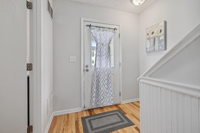 1994 Hoadley Dr Unit 7C, Columbus, OH 43228 - foyer featuring baseboards and wood finished floors