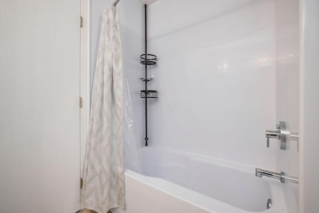1994 Hoadley Dr Unit 7C, Columbus, OH 43228 - bathroom featuring shower / bath combination with curtain