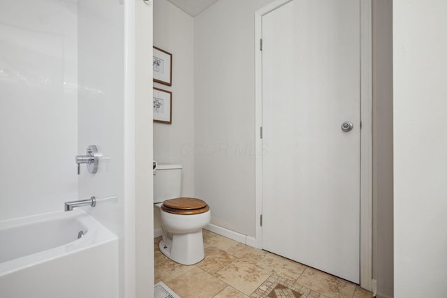 1994 Hoadley Dr Unit 7C, Columbus, OH 43228 - full bath featuring toilet,  shower combination, and baseboards