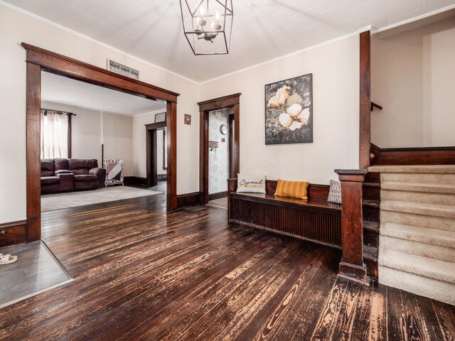 154 Montgomery Blvd, New Concord, OH 43762 - foyer entrance featuring hardwood / wood-style floors, ornamental molding, a chandelier, stairway, and baseboards