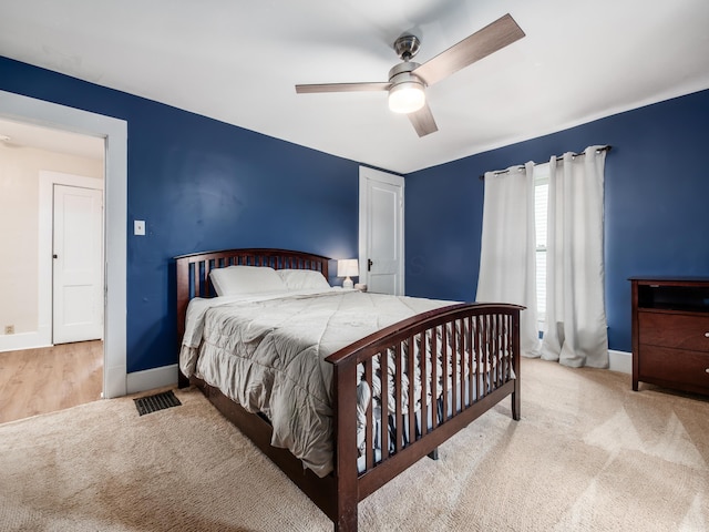 154 Montgomery Blvd, New Concord, OH 43762 - carpeted bedroom with baseboards and ceiling fan