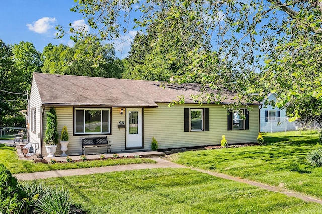 225 W Heffner St, Delaware, OH 43015 - view of front facade featuring roof with shingles and covered porch