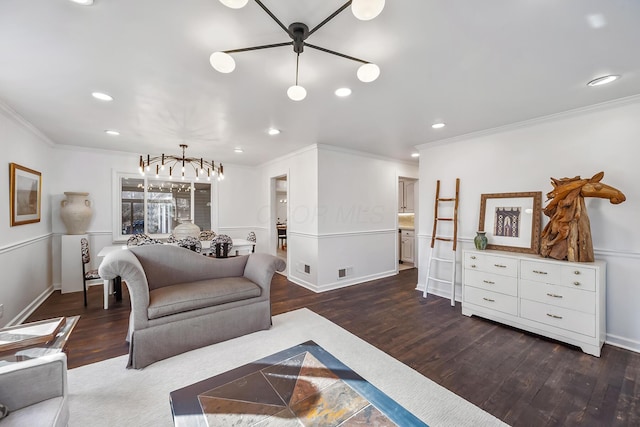 225 W Heffner St, Delaware, OH 43015 - living area featuring dark wood finished floors, crown molding, recessed lighting, baseboards, and a ceiling fan