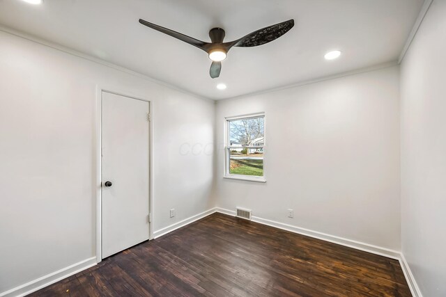 225 W Heffner St, Delaware, OH 43015 - empty room with dark wood-type flooring, ceiling fan, crown molding, baseboards, and recessed lighting