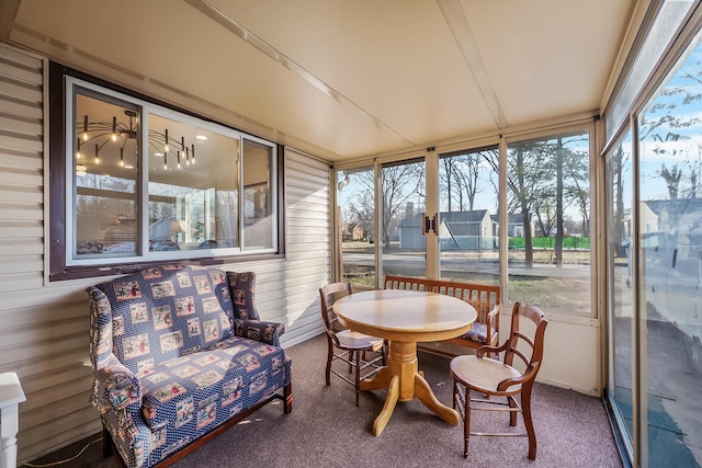 225 W Heffner St, Delaware, OH 43015 - sunroom featuring healthy amount of natural light, carpet, and wood walls