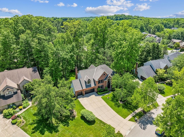 1229 Whispering Meadow Ct, New Albany, OH 43054 - aerial view of property and surrounding area featuring a heavily wooded area