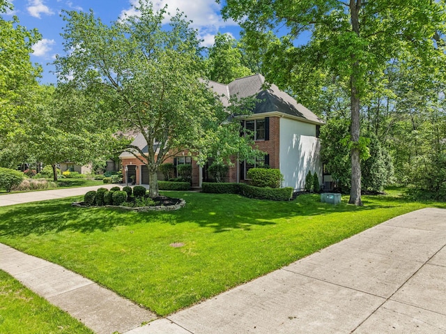 1229 Whispering Meadow Ct, New Albany, OH 43054 - view of front of property featuring a front yard and brick siding