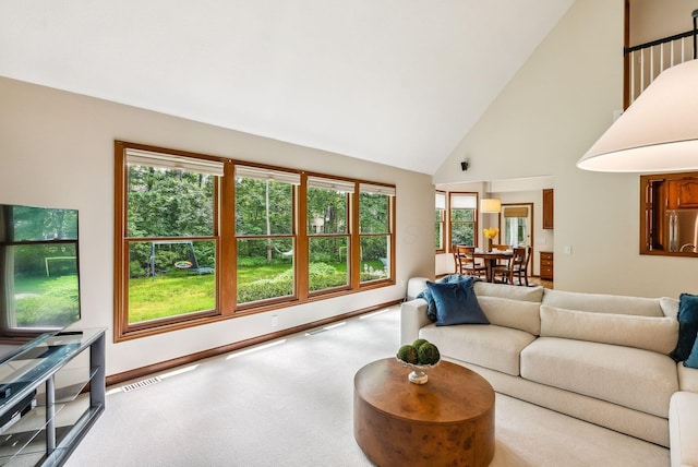 1229 Whispering Meadow Ct, New Albany, OH 43054 - living area featuring high vaulted ceiling and carpet