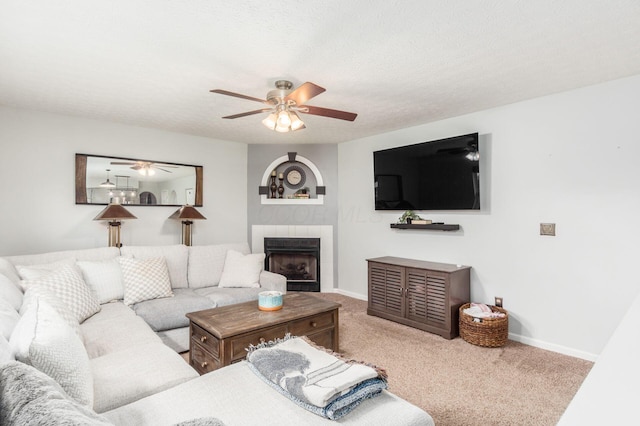 2535 Linbaugh Rd, Grove City, OH 43123 - living room with carpet flooring, a ceiling fan, baseboards, and a fireplace