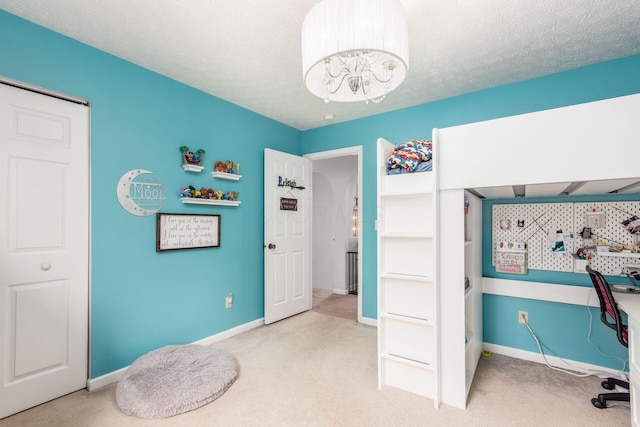 2535 Linbaugh Rd, Grove City, OH 43123 - carpeted bedroom featuring a chandelier and baseboards