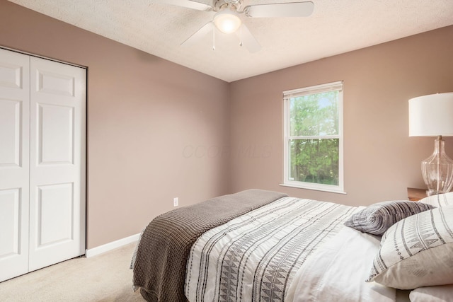 2535 Linbaugh Rd, Grove City, OH 43123 - bedroom featuring light colored carpet, a ceiling fan, a closet, and baseboards