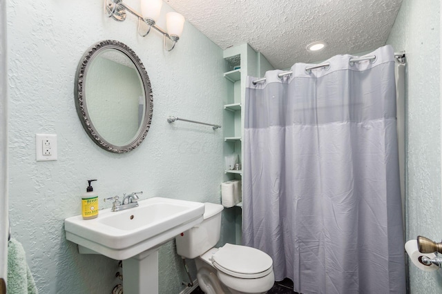 2535 Linbaugh Rd, Grove City, OH 43123 - full bathroom with a textured wall, a textured ceiling, toilet, and a shower with shower curtain