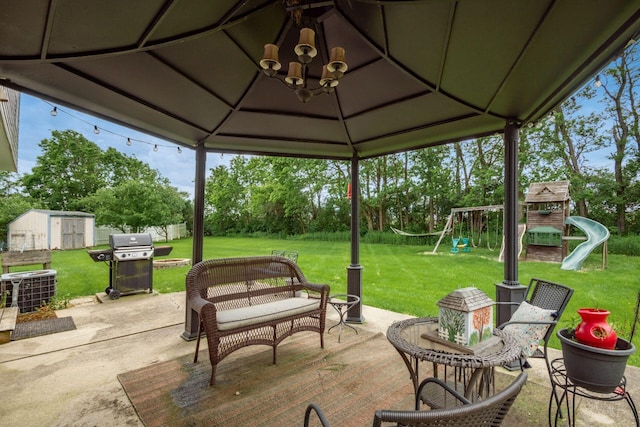 2535 Linbaugh Rd, Grove City, OH 43123 - view of patio with a playground, a grill, a gazebo, and view of scattered trees