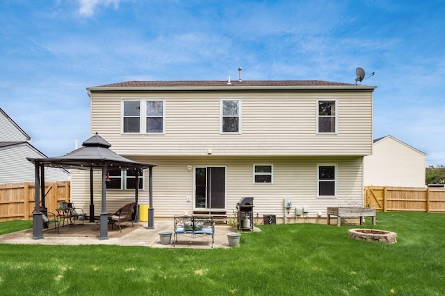 2535 Linbaugh Rd, Grove City, OH 43123 - back of property with a gazebo, a fire pit, and a patio area