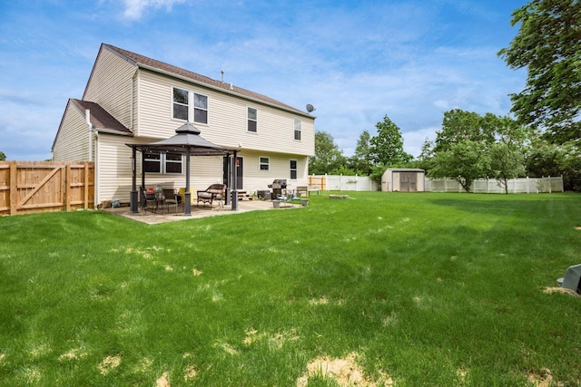 2535 Linbaugh Rd, Grove City, OH 43123 - rear view of house with a gazebo, a patio, and roof with shingles