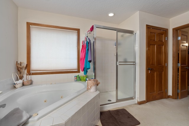 7415 Sand Spurrey Ct, Westerville, OH 43082 - bathroom with a stall shower and a jetted tub