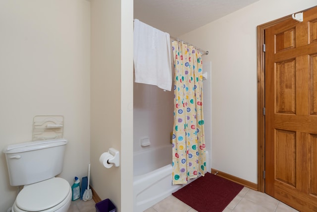 7415 Sand Spurrey Ct, Westerville, OH 43082 - full bathroom with toilet, tile patterned flooring, shower / bathtub combination with curtain, and baseboards