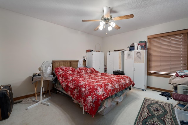 7415 Sand Spurrey Ct, Westerville, OH 43082 - bedroom with light carpet, baseboards, and a ceiling fan